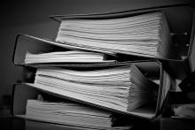 A stack of lever arch files