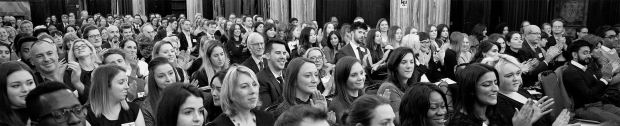 An audience applauding the stage An audience applauding the stage